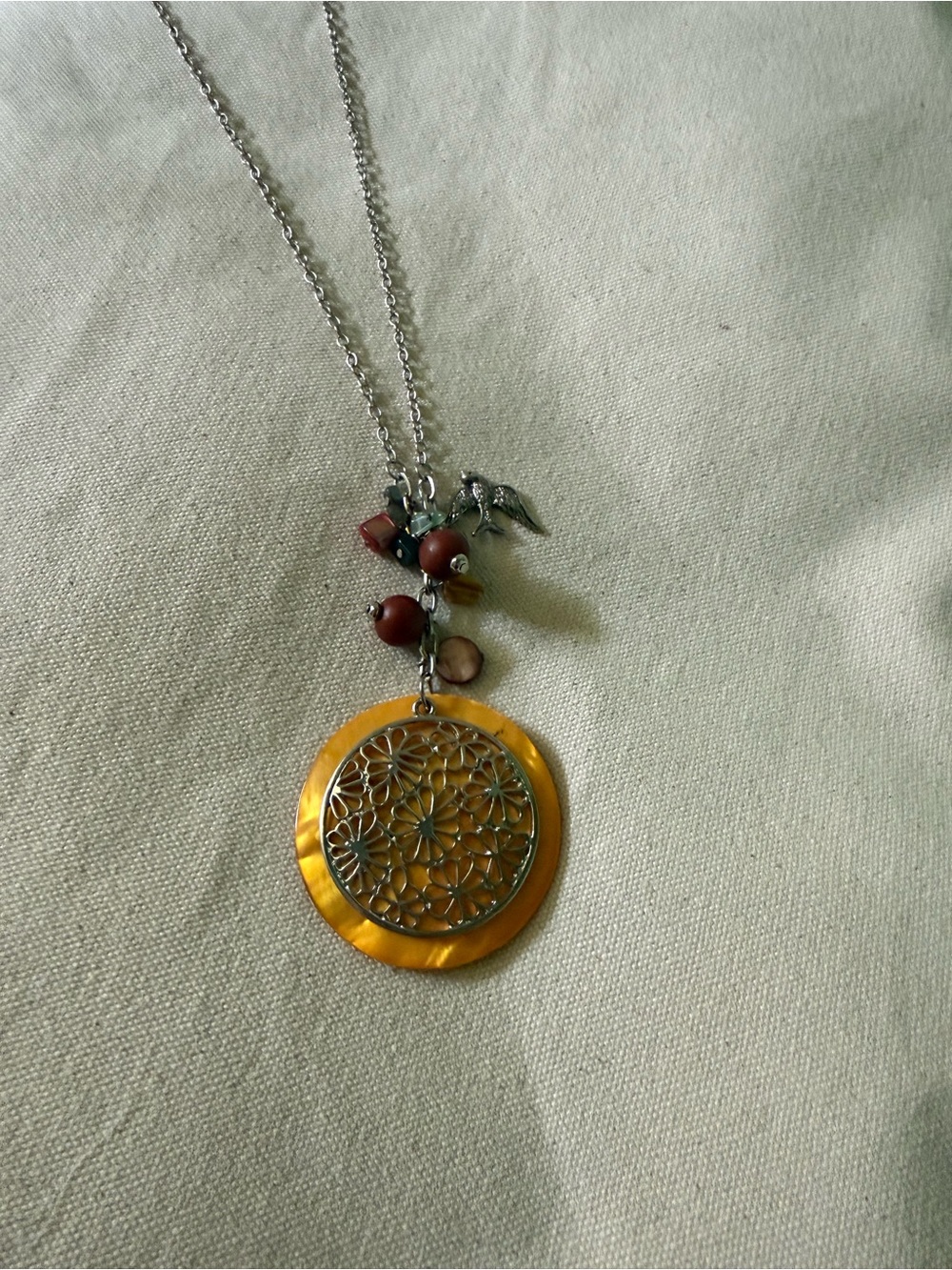 Silver-Tone Yellow Shell Pendant Necklace with Red Bead Accents